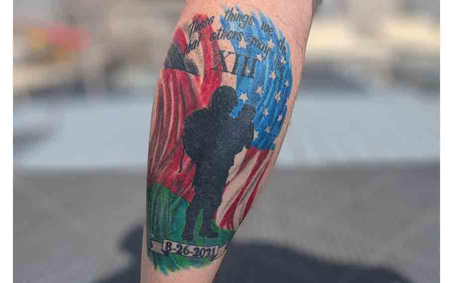A tattoo representing 13 fallen military members on Michael Gross’s leg.